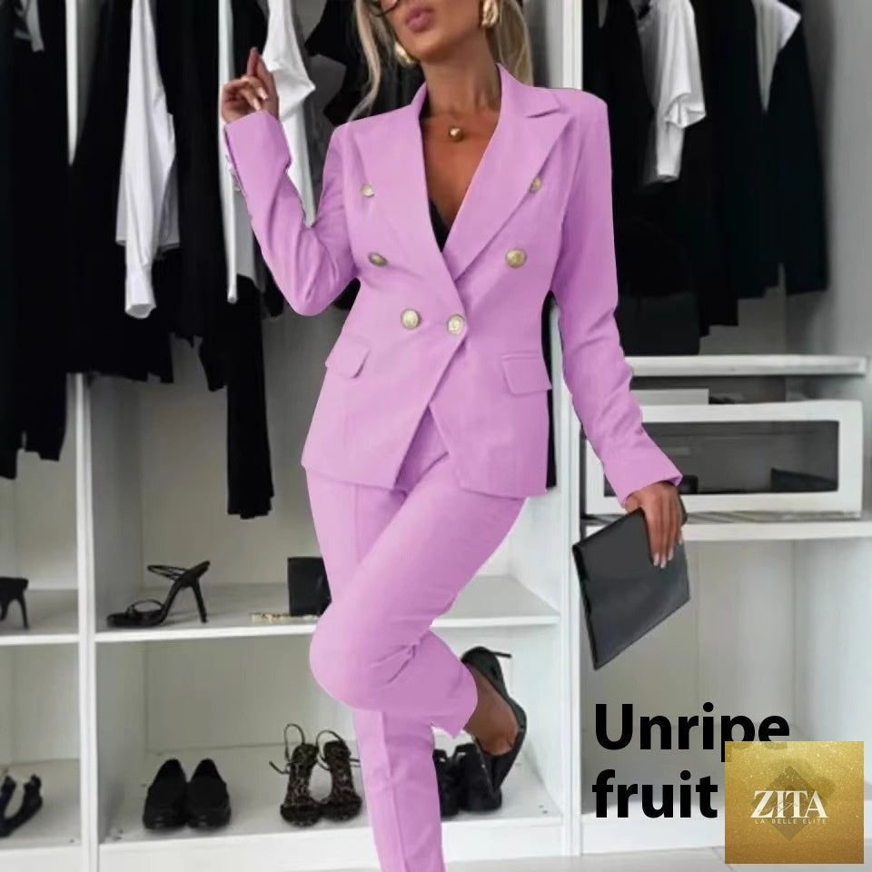 FitiqueFit double-breasted lapel blazer and zip-up trousers two-piece suit, shown on a model in a stylish indoor setting.