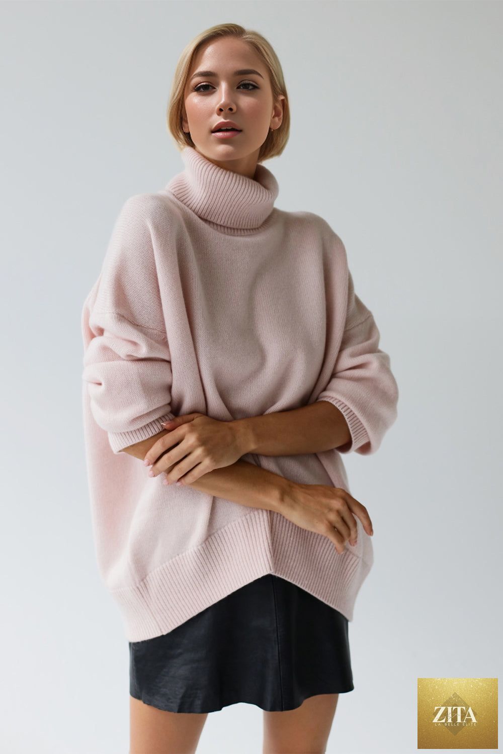 ShopBasicbae basic beige turtleneck sweater with dropped shoulders and long sleeves, showcasing a cozy, relaxed fit.