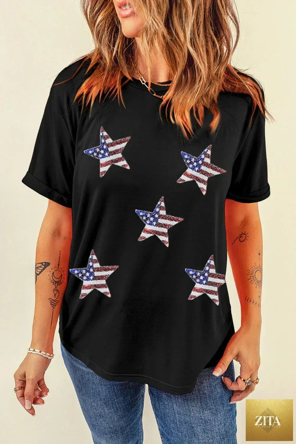 Black sequined American flag star graphic tee by Femstylo, featuring bold star and flag design on a casual t-shirt.