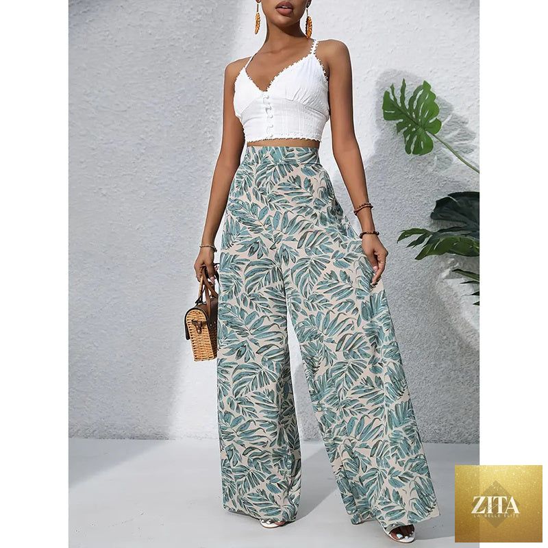 Women’s printed high-waist wide-leg palazzo pants in casualwear style by FitiqueFit, showing colorful floral pattern and relaxed fit.