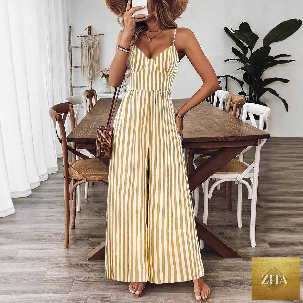 Yellow printed backless sleeveless strap jumpsuit by FitiqueFit featuring a relaxed fit and stylish design.