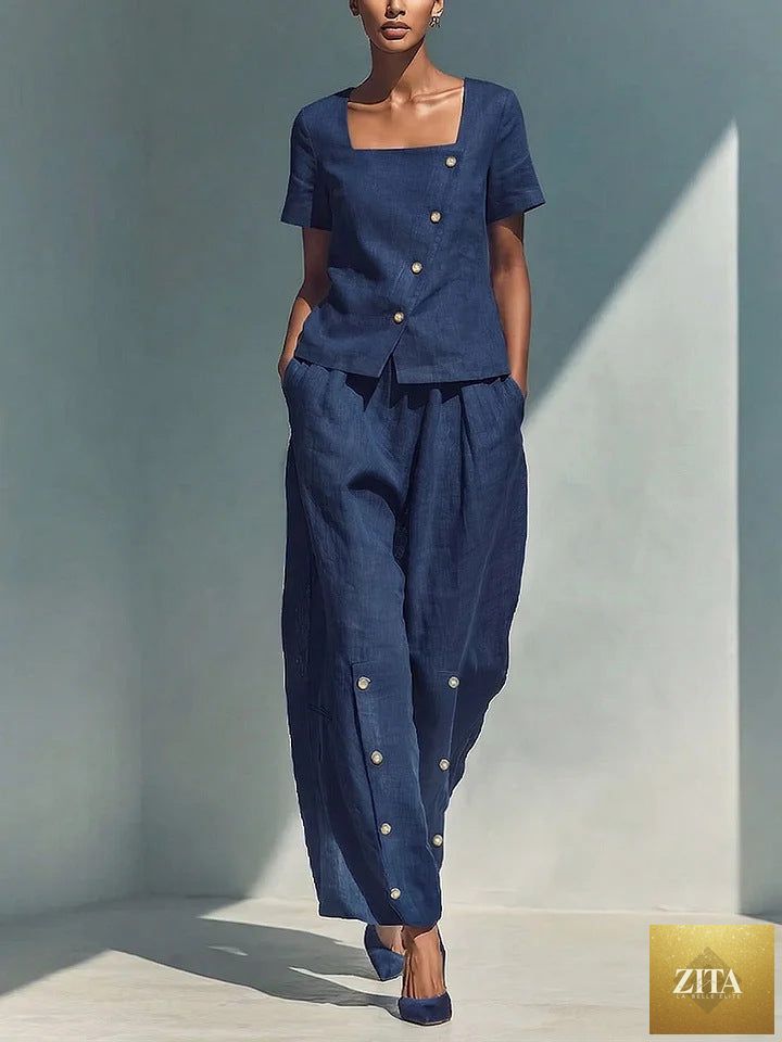 Plus size women's casualwear set with loose short-sleeve top and high-waist pants by Zita La Belle Elite, shown on a model.