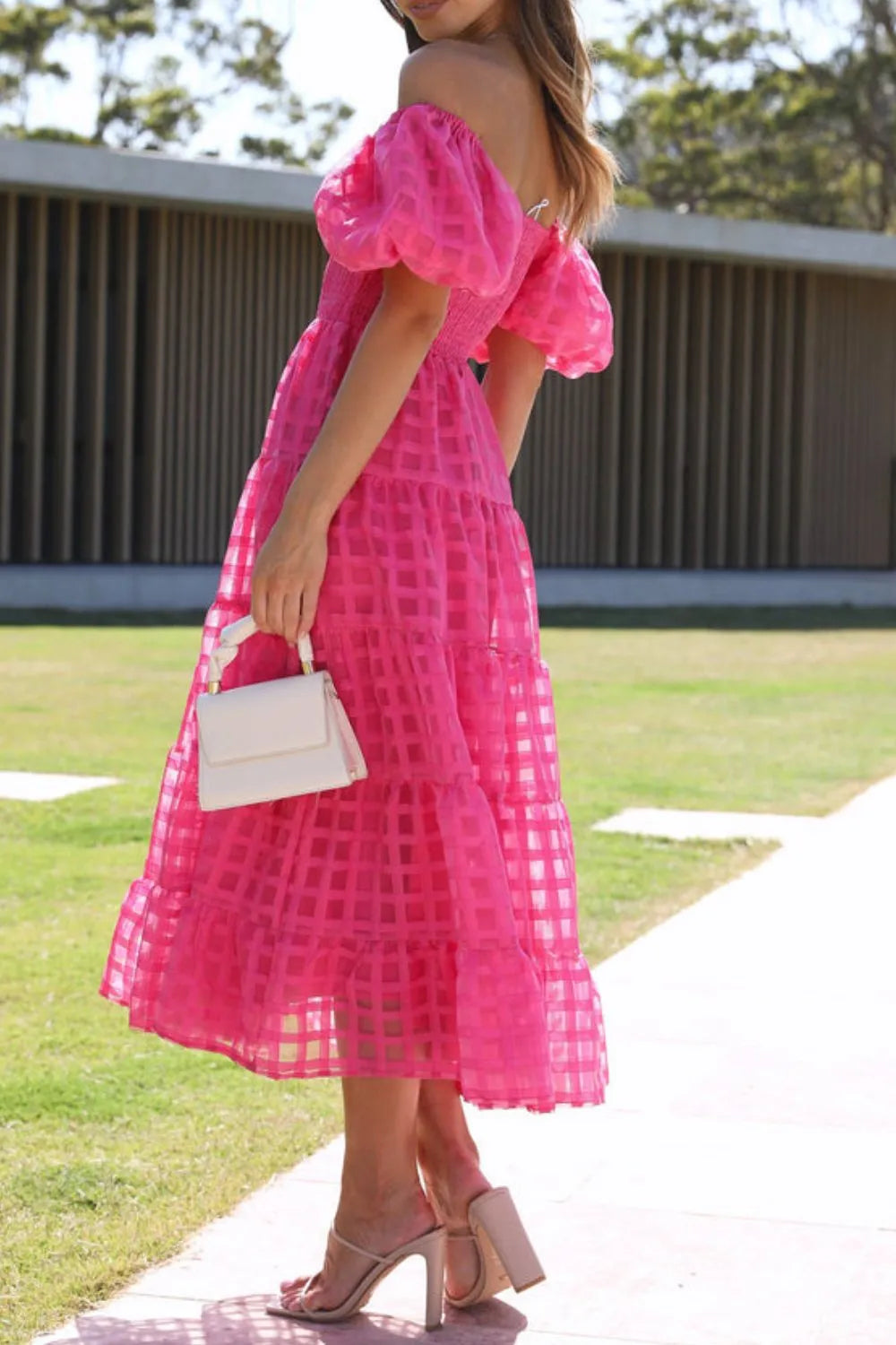 Off shoulder short puff sleeve midi dress by Shopiebay, featuring a stylish silhouette and elegant design in a soft fabric.