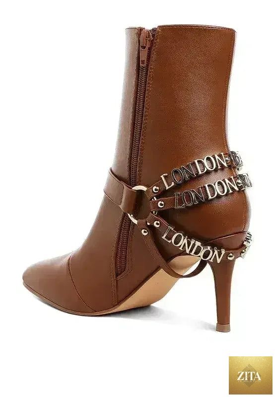Femstylo buckle harness stiletto boots with 3-inch heels, featuring stylish straps and sleek leather finish.
