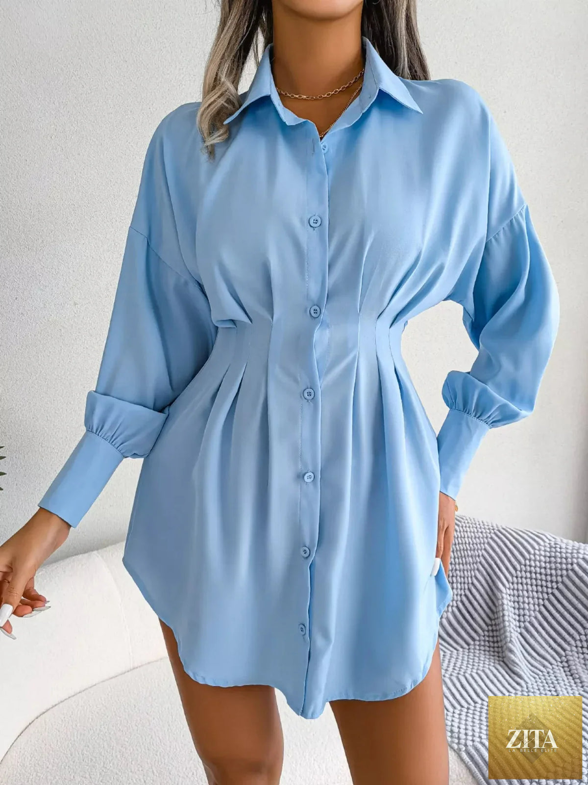 Elegant button-down mini shirt dress with cinched waist from Shopimist, featuring a classic collar and long sleeves.