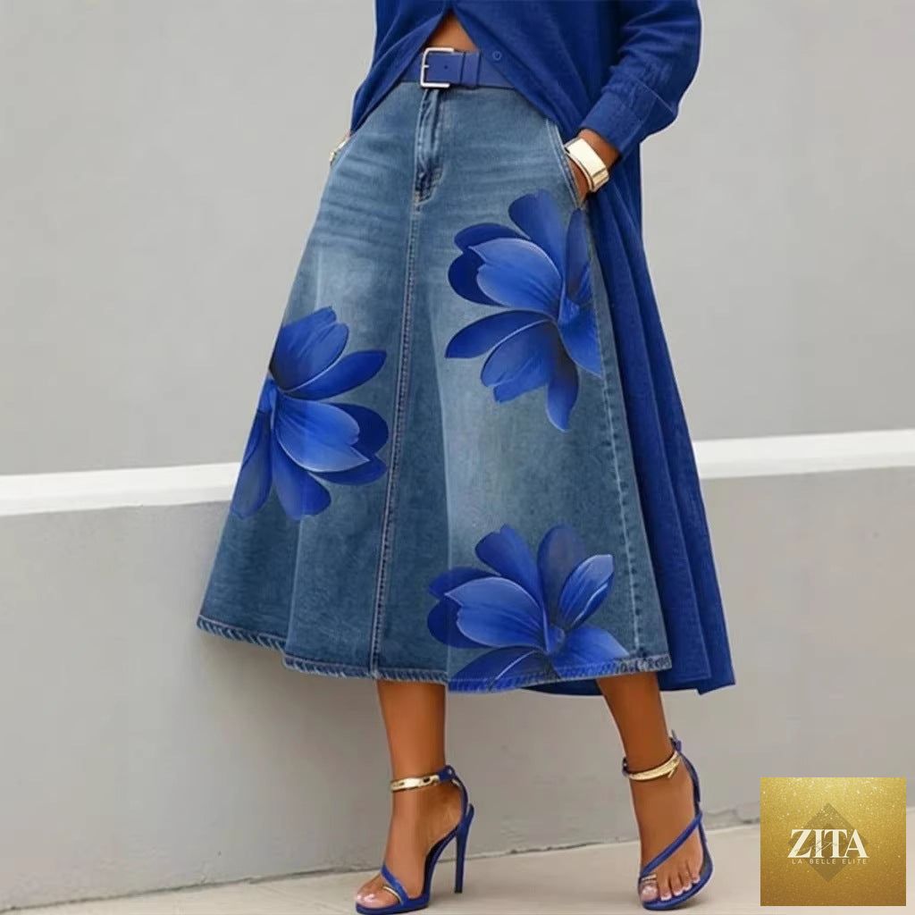 Women's floral print denim-style boho A-line midi skirt from FitiqueFit, featuring a flowy design and vibrant floral pattern.