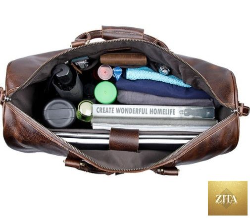Large capacity cowhide trolley travel bag by Social Buzz eSIMs with sturdy wheels and spacious interior for travel convenience.
