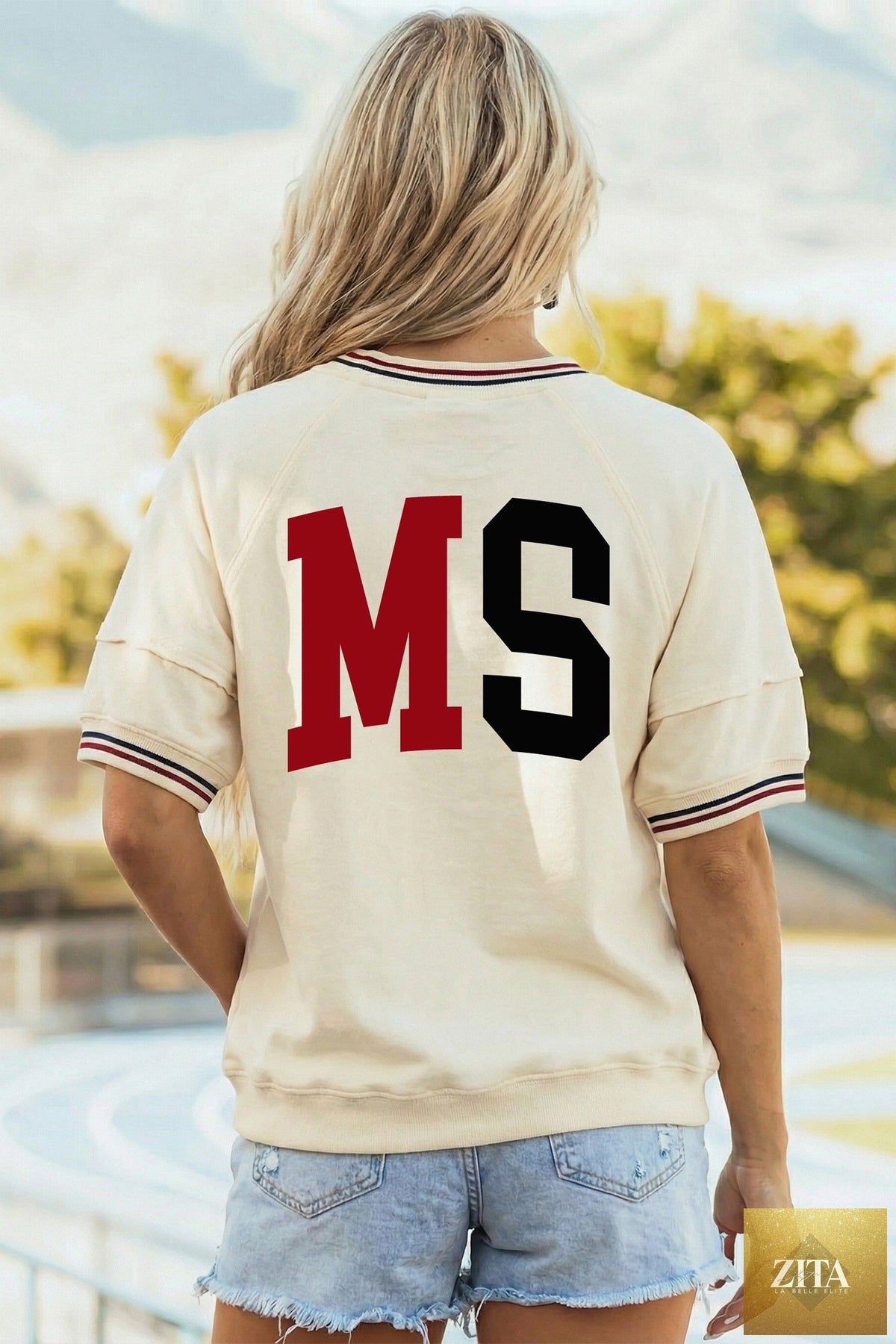Beige reversible Mississippi MS graphic tee by Wild and Free Boutique, short sleeve preppy printed top showing a stylish design.