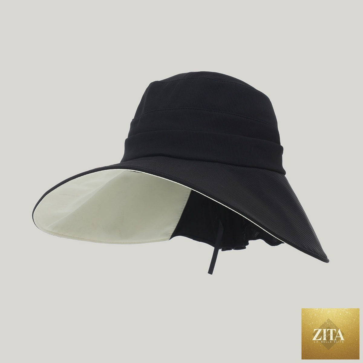 Women's wide-brim striped sun hat by Zita La Belle Elite, lightweight outdoor hat with UV protection and stylish design.