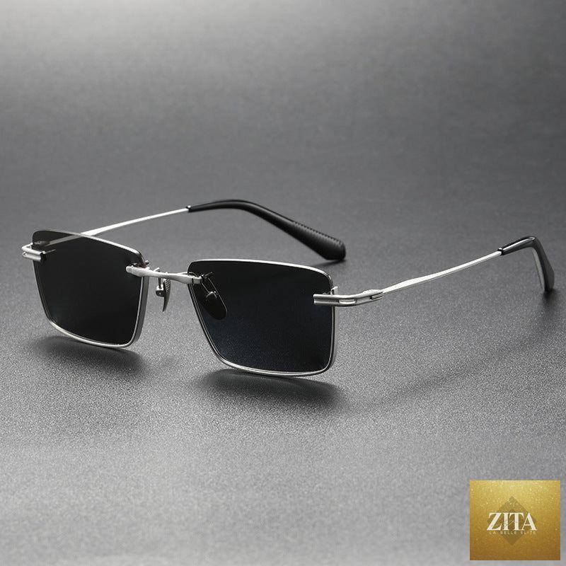 Pure titanium polarized sunglasses with retro British style from FitiqueFit, featuring classic round frames and tinted lenses.