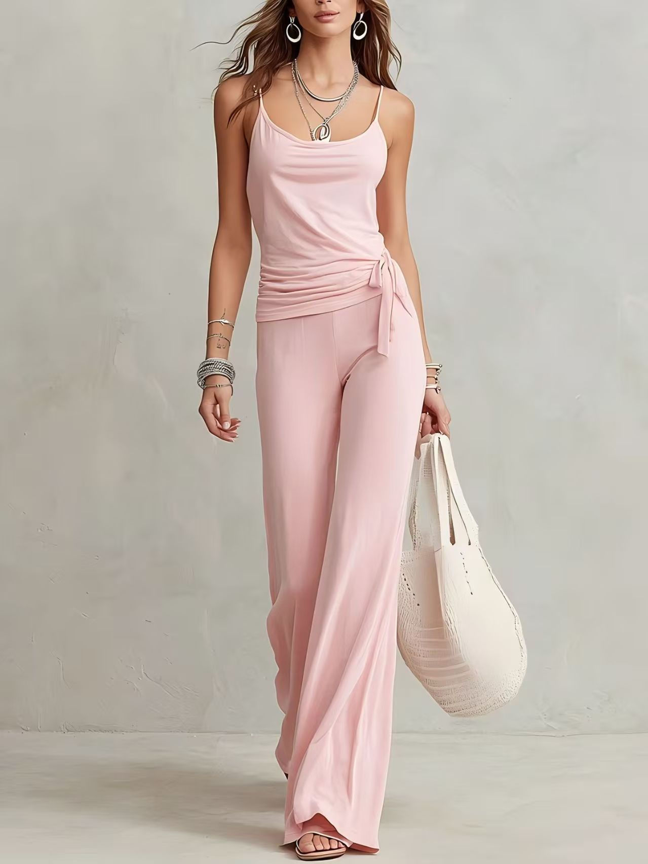 FitiqueFit women's sleeveless two-piece casual set with solid color top and matching pants, perfect for relaxed everyday wear.