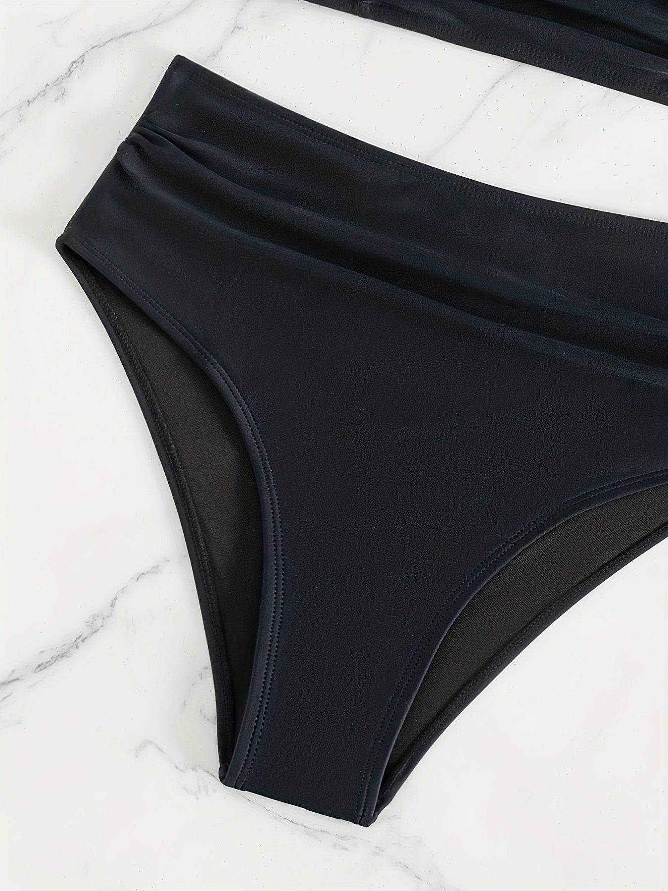 Stevvex black high waist bikini set with twist front, V neck, ruched tummy control, and cross strap detail for women’s summer swimwear.