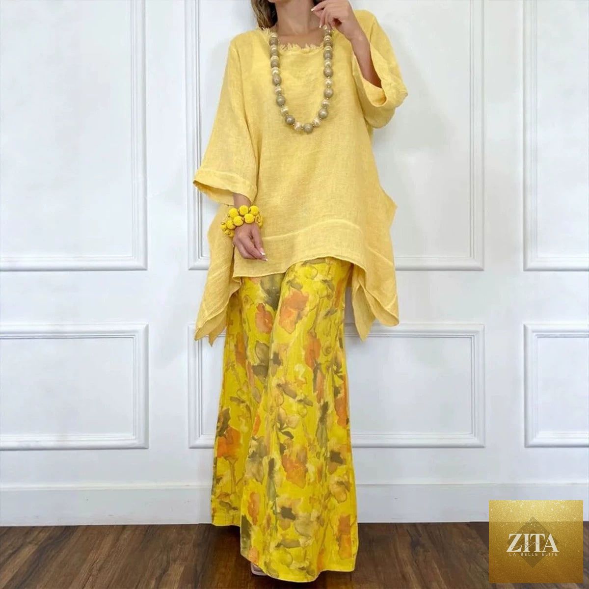 Cotton-linen irregular hem drop-shoulder top with wide-leg pants set by Zita La Belle Elite in three colors, casual and stylish.