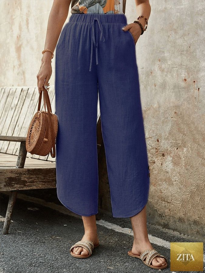 Light beige women's cotton-linen cropped drawstring pants from FitiqueFit, casualwear with a relaxed fit and adjustable waist.
