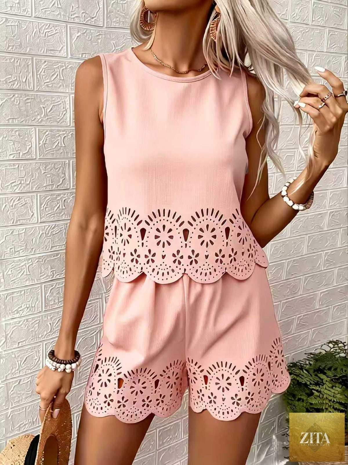 Women's elegant floral hollow-out top and pants set by Zita La Belle Elite, featuring a stylish casualwear 2-piece ensemble.