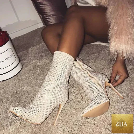 Women rhinestone high heel boots with pointed toe and stylish design, featuring sparkling embellishments for a glamorous look.