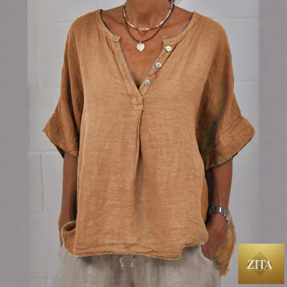 Women's cotton linen V-neck button-up shirt by Zita La Belle Elite, casualwear, light fabric, relaxed fit, shown on a model.