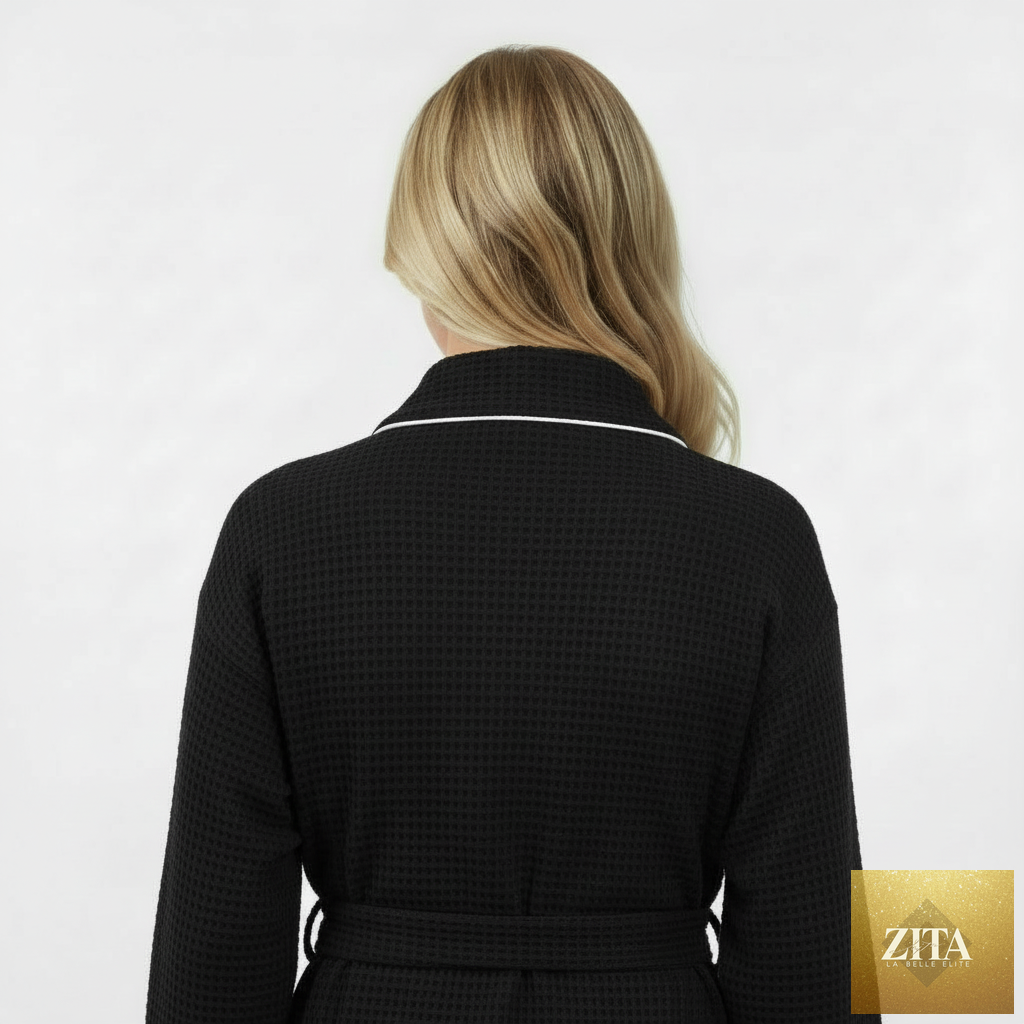 Women’s black waffle piping bathrobe by Lotus Linen, lightweight spa-style robe with back detail and piping accents.