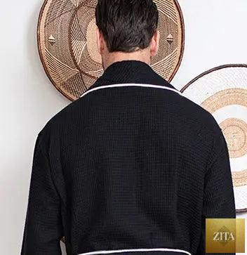 Black men's waffle piping robe from Lotus Linen, shown from the back with small piping details and a comfortable fit.