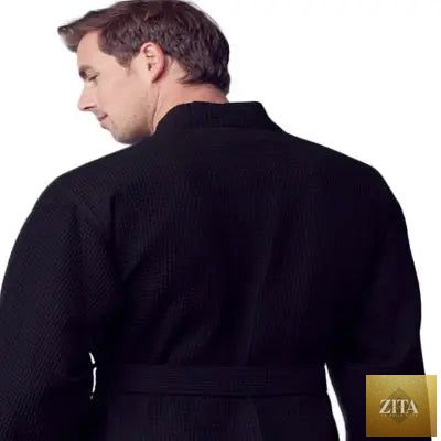 Black Lotus Linen waffle spa bathrobe for men, lightweight and absorbent, shown from the back with a small size fit.