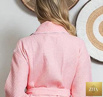 Back view of Lotus Linen women's blush waffle piping bathrobe, lightweight spa-style robe with piping detail, comfortable and cozy.