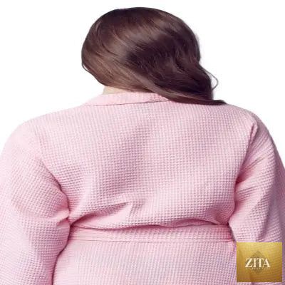 Back view of small blush Lotus Linen knee-length waffle robe for women, showing soft fabric and relaxed fit.