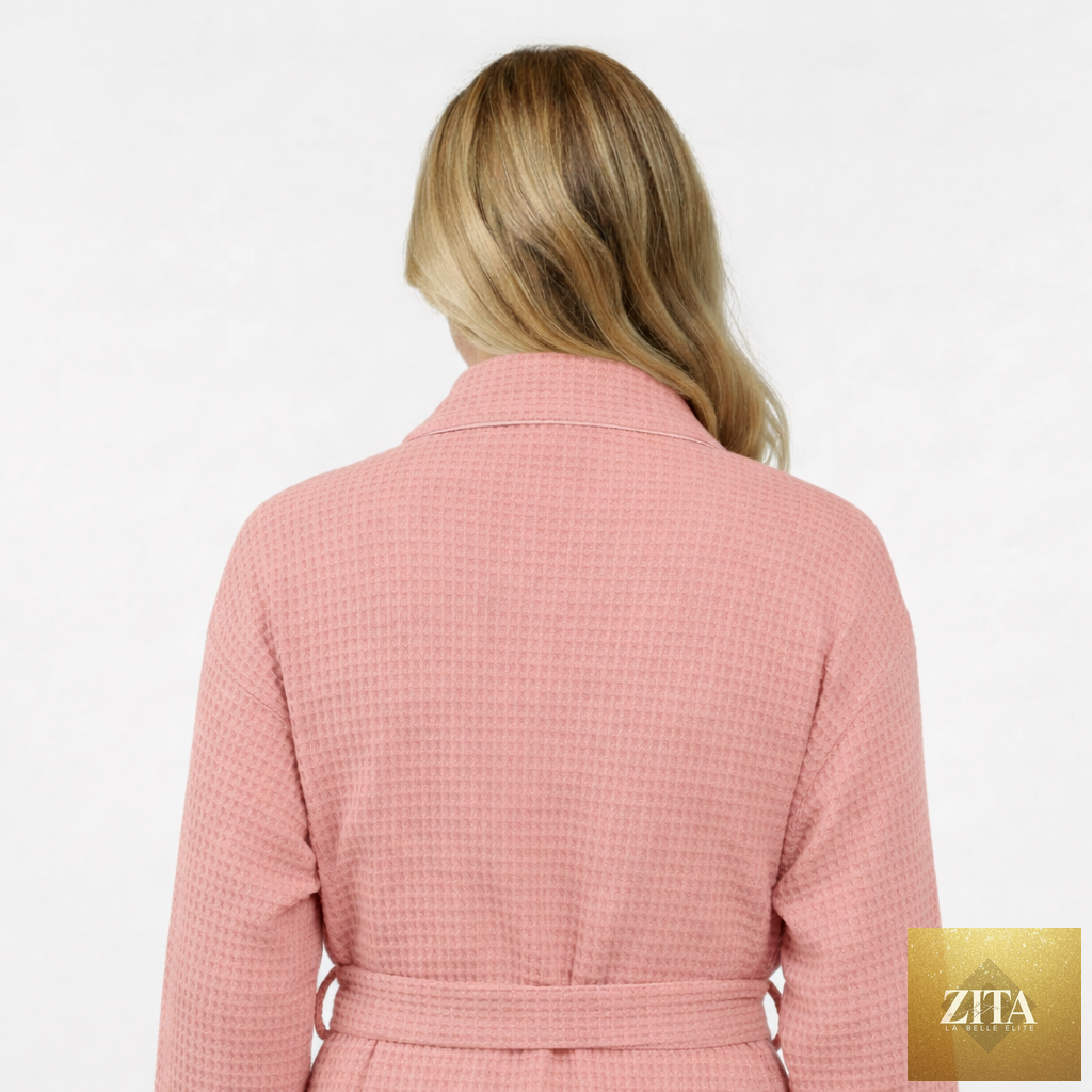 Back view of small blush knee-length waffle robe for women by Lotus Linen, showcasing soft fabric and relaxed fit.