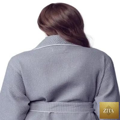 Light grey women's waffle piping bathrobe from Lotus Linen, showing back view with lightweight spa-style comfort and small size.
