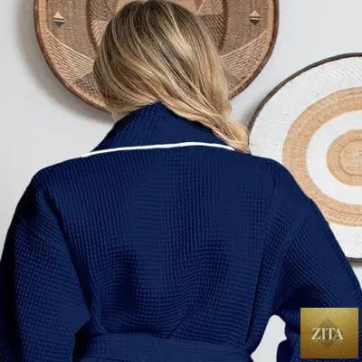 Navy women's waffle piping bathrobe from Lotus Linen, lightweight spa-style robe with piping detail, shown from the back.