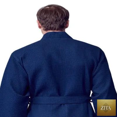 Navy blue Lotus Linen waffle spa bathrobe for men, lightweight and absorbent, shown from the back with a small collar and textured fabric.