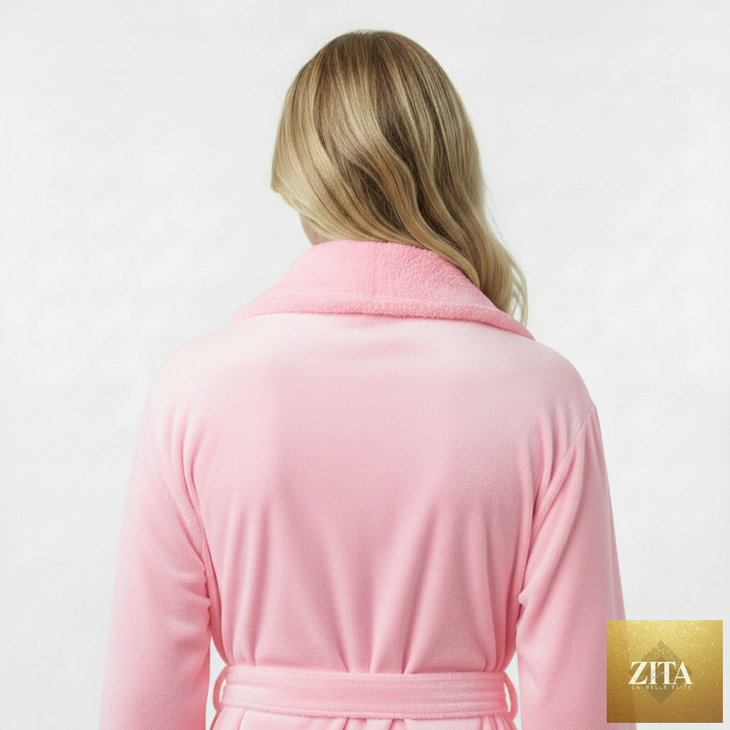 Pink women's plush bathrobe from Lotus Linen, showing the back view with a soft, cozy texture and small size fit.