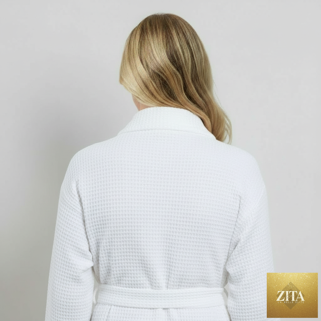 Back view of a small white knee-length waffle robe for women by Lotus Linen, showing textured fabric and relaxed fit.