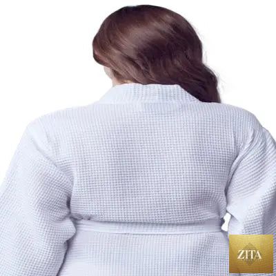 White knee-length waffle robe for women by Lotus Linen, showing the back view with small size and textured fabric.