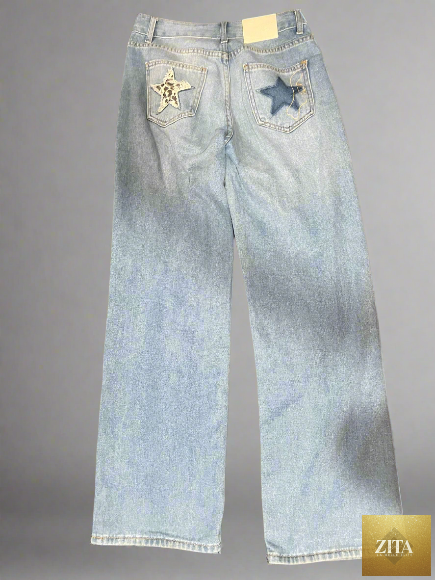Pair of Charlotte Summers women's jeans by Zita La Belle Elite, featuring classic denim with a fitted design and belt loops.