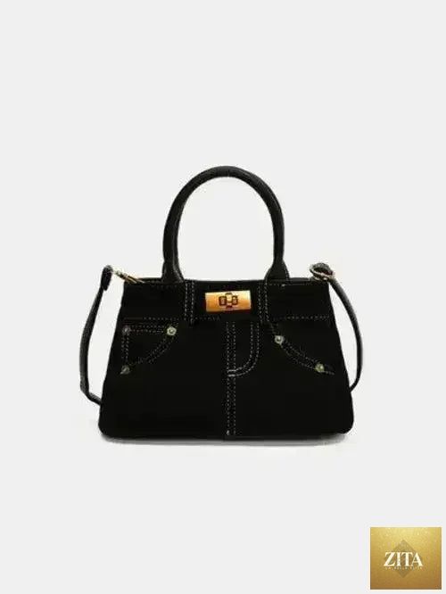 Femstylo suede handbag with adjustable strap, featuring a dual-use design, shown with a stylish, textured exterior.