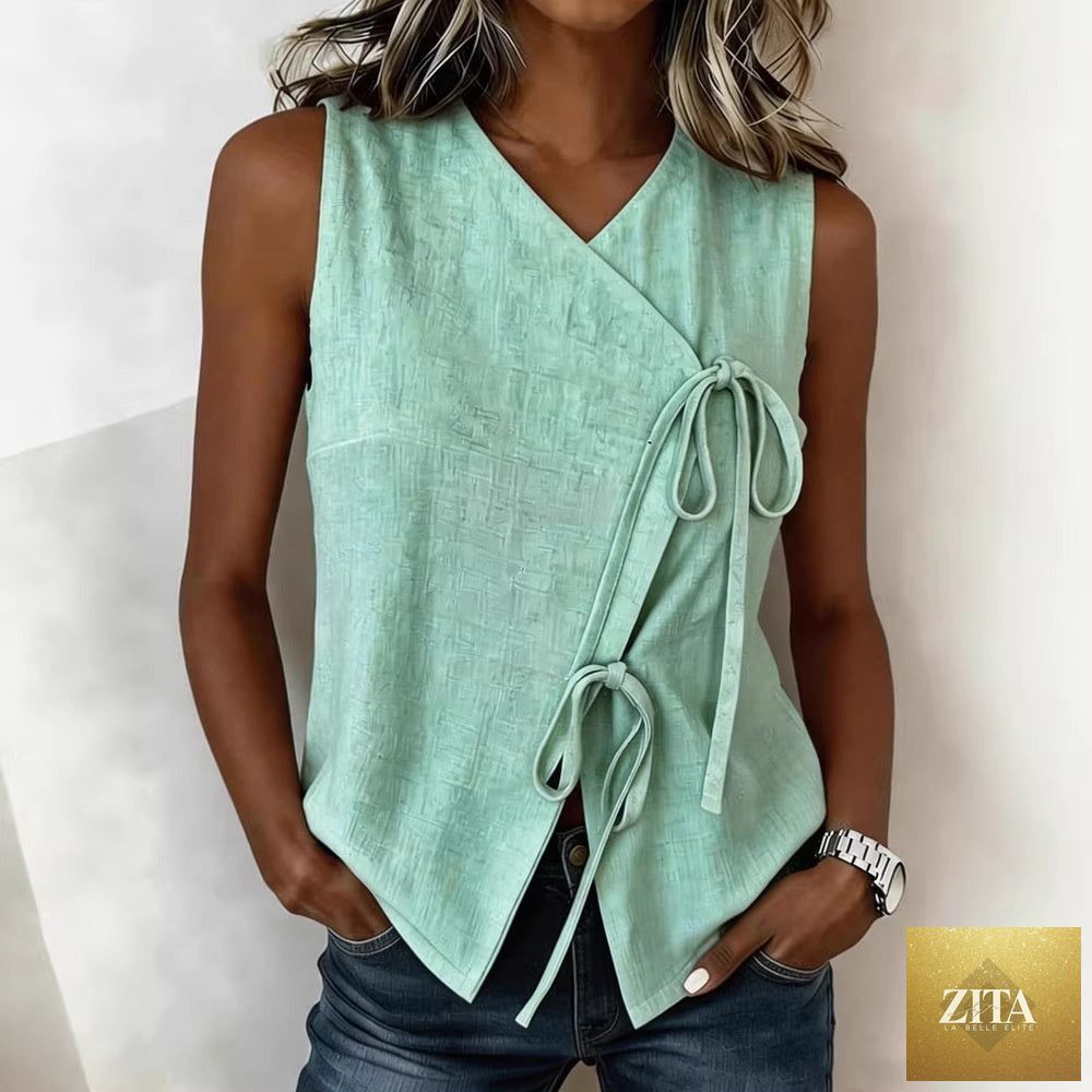 Waterfront view of FitiqueFit Bow-Tied V-Neck Sleeveless Tank Top in five colors, casualwear for women, size S to XXL.