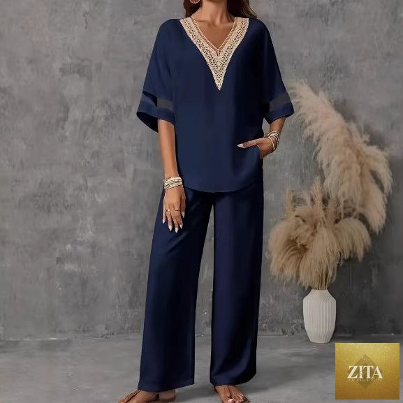 Women's embroidered V-neck top and wide-leg pants set by Zita La Belle Elite in five colors, shown in a stylish casual outfit.