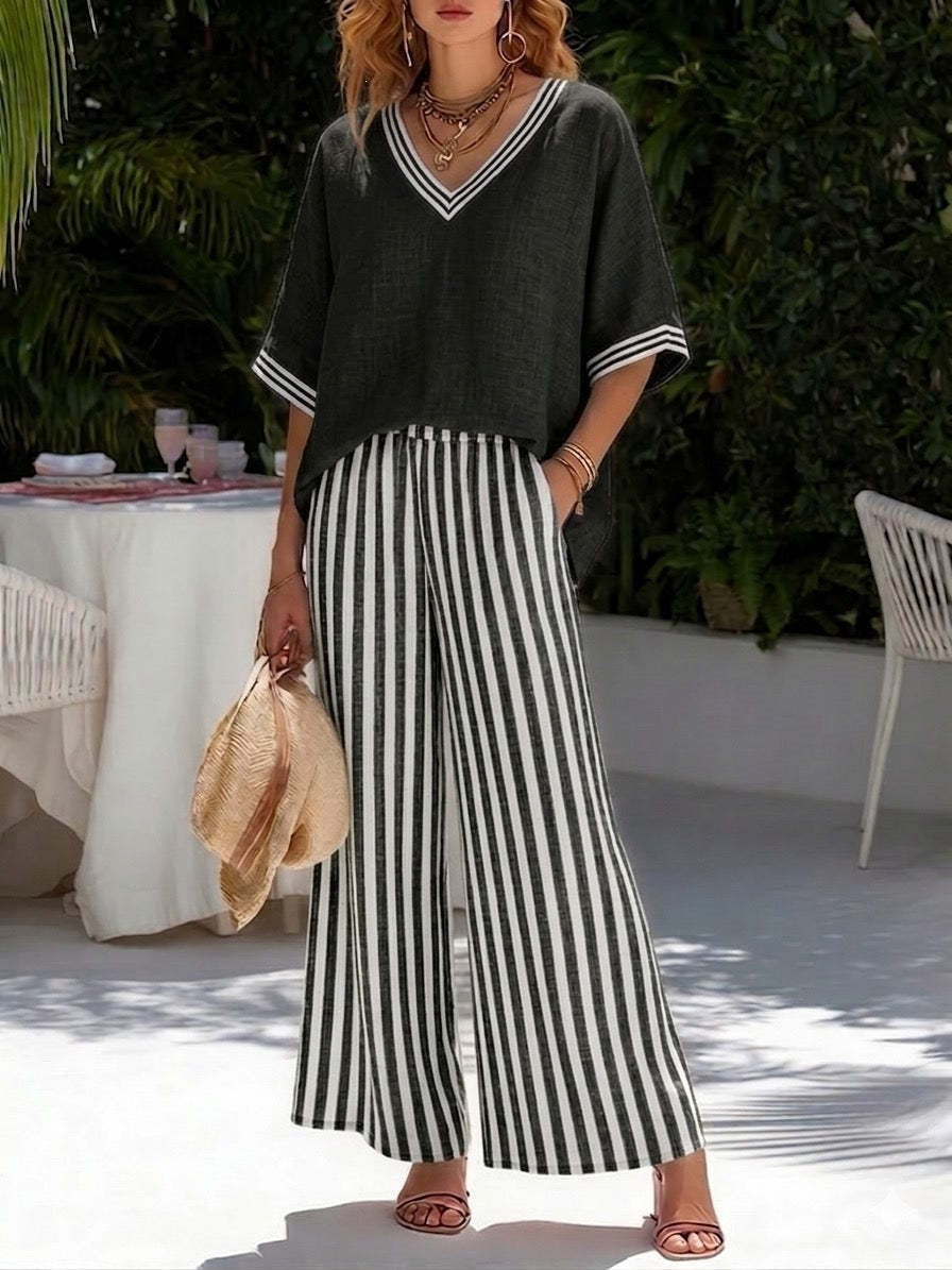 Women's striped tunic top and casual trousers two-piece set by FitiqueFit, featuring a relaxed fit and comfortable fabric.