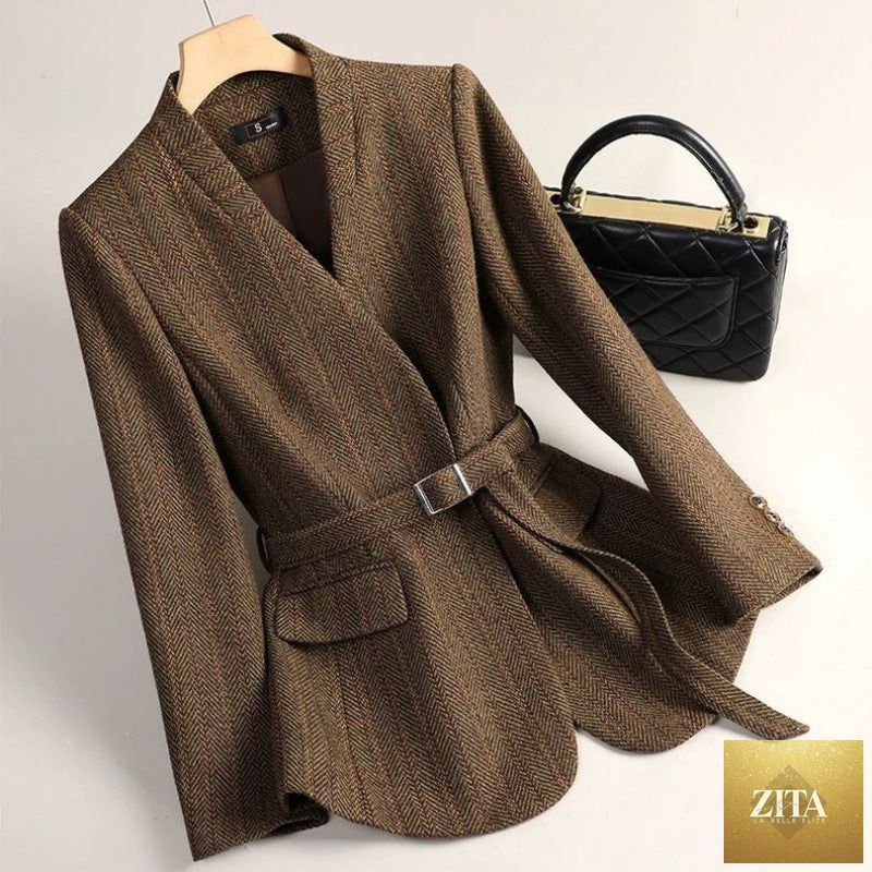 Women’s sophisticated wool blazer from Sell My Stuff, tailored fit with classic lapel and button closure, stylish for professional wear.
