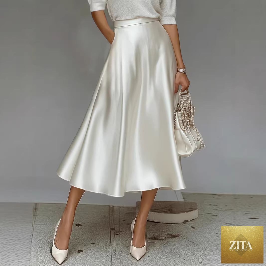Women’s satin solid color mid-length skirt by Zita La Belle Elite, featuring a slight stretch and smooth fabric.