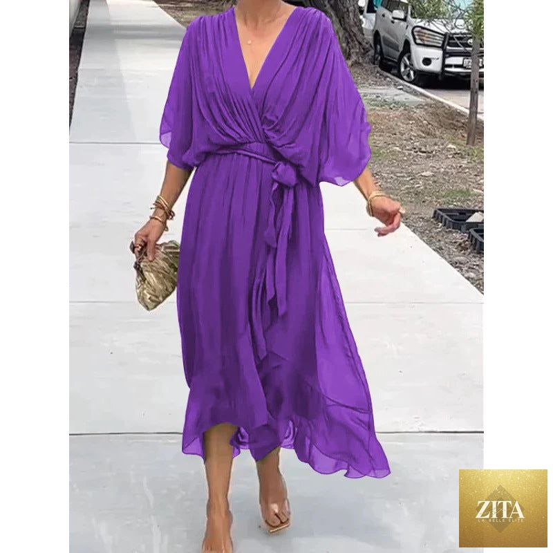 FitiqueFit Batwing Sleeve V-Neck Midi Dress with tied irregular hem, showcasing a stylish and flowing fairy dress design.