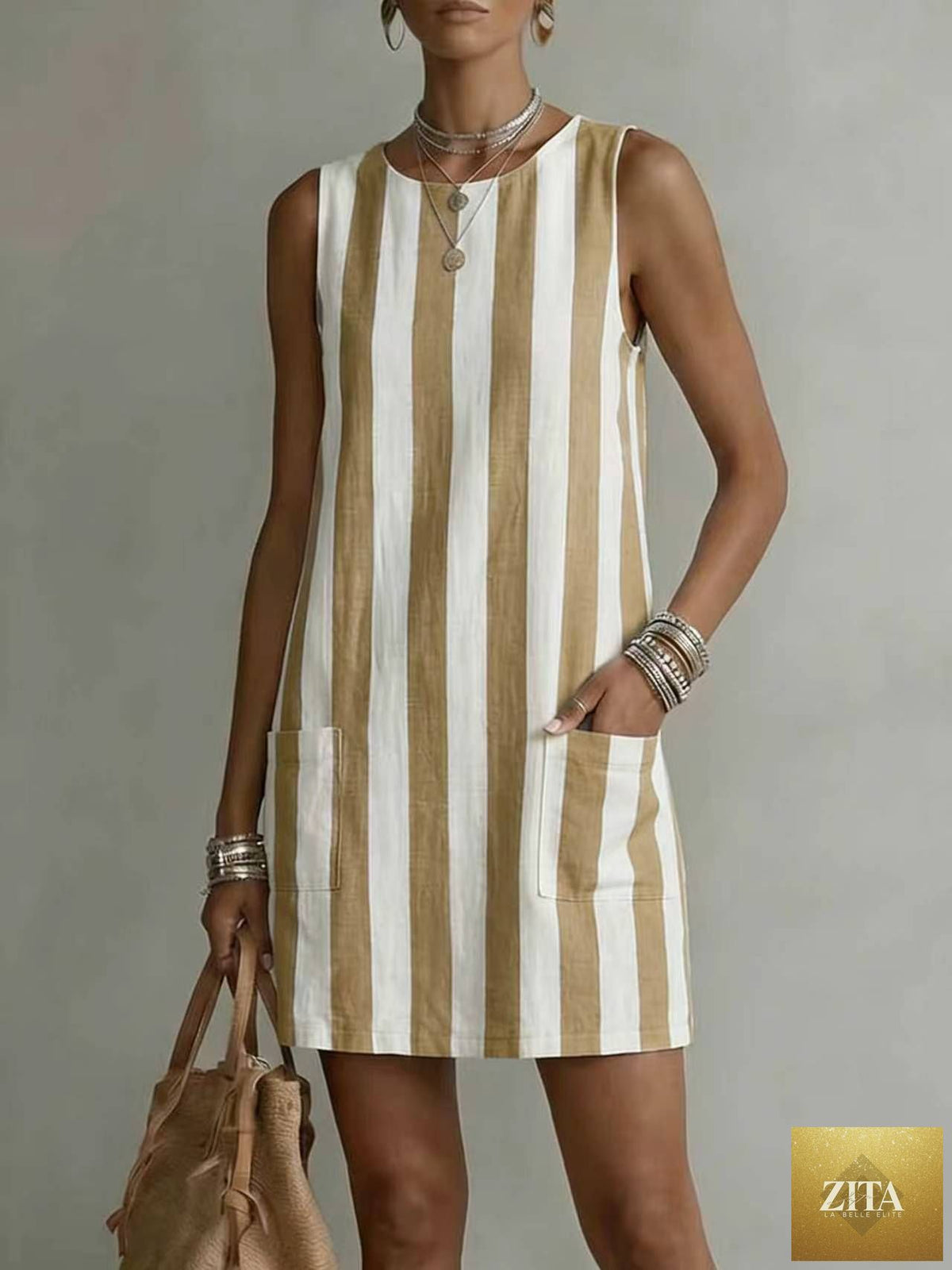 Women's striped color-block sleeveless mini dress by FitiqueFit featuring a loose fit, casual style, with bold horizontal stripes.