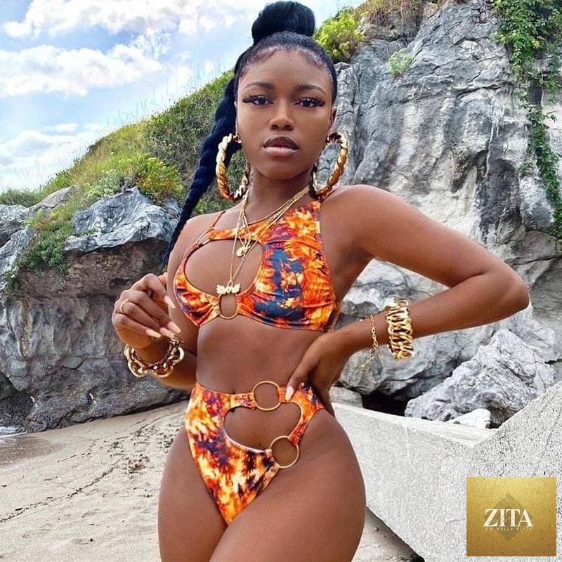 Stevvex women's two-piece bikini with cut-out design, chain ring accents, string top, and tight fit for summer beachwear.