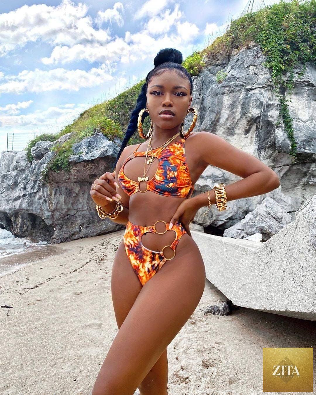 Stevvex women's two-piece bikini with cut-out design, chain ring details, string top, and matching bottoms, perfect for summer beachwear.