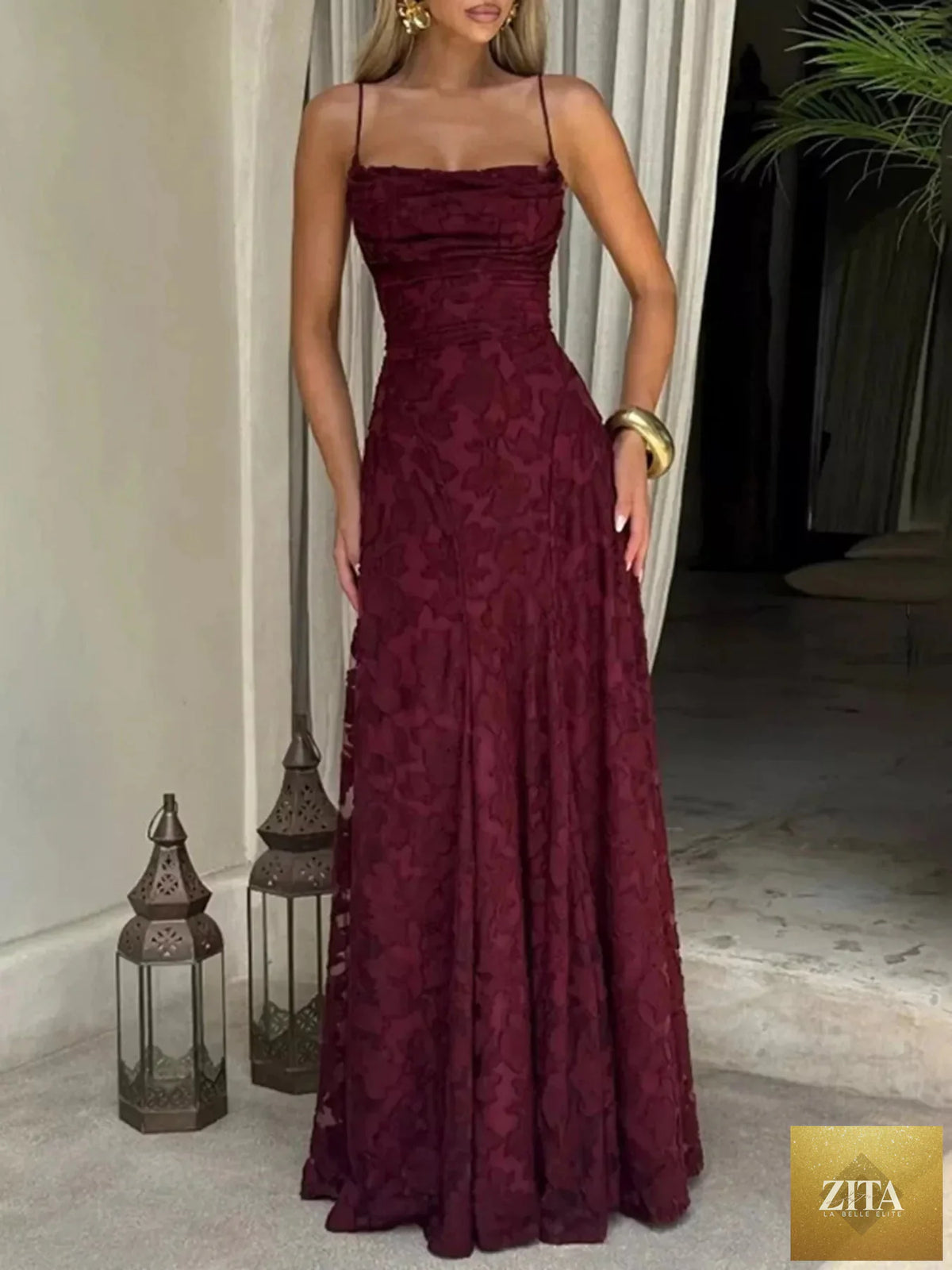 Lace spaghetti strap maxi dress by Shopiebay featuring delicate lace details and a flowing silhouette, perfect for elegant occasions.