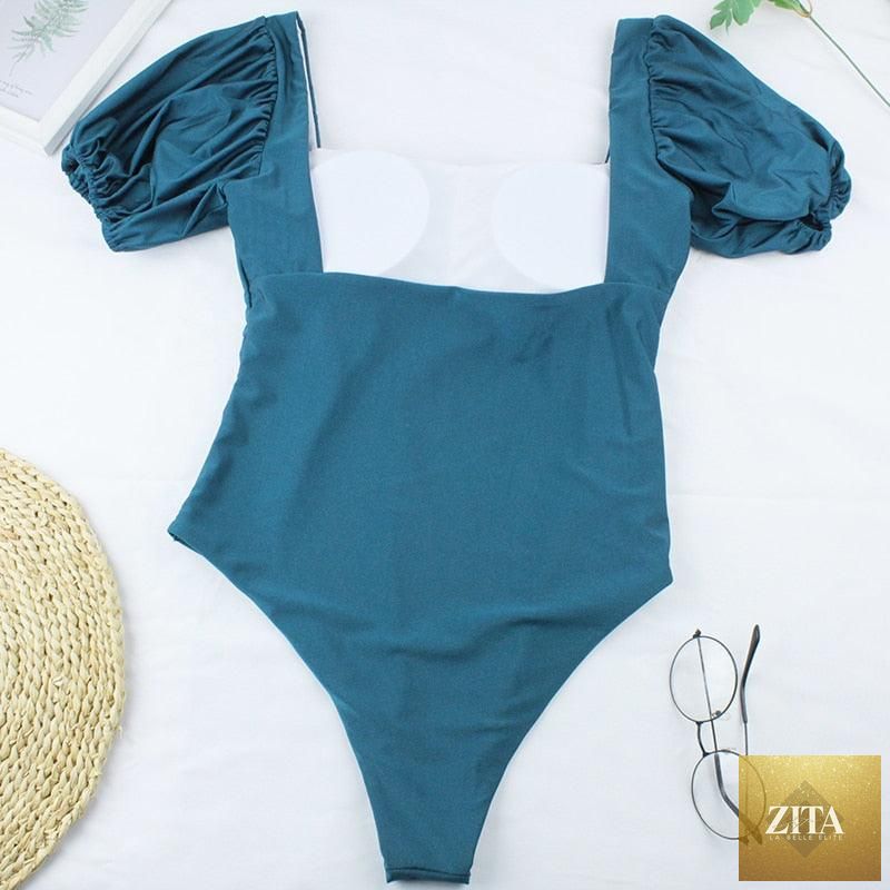 Stevvex high-waist 2-piece bikini set with puff sleeves, solid color, backless design, perfect for summer beachwear.