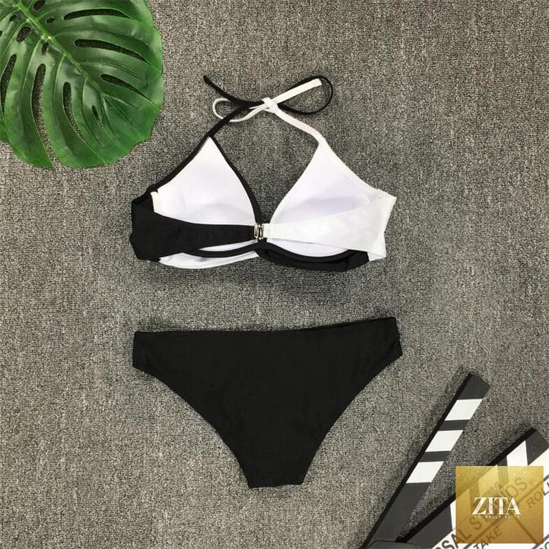 Stevvex women's two-piece bikini set with push-up pads, halter bandage style, perfect for summer beachwear and swimming.