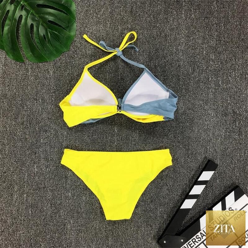 Stevvex women's push-up bikini set with halter straps, bandage design, and padded cups, perfect for summer beachwear and swimming.
