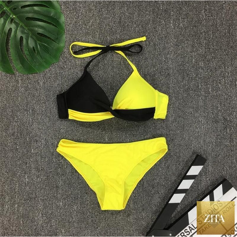 Stevvex women's push-up bikini set featuring halter neck, bandage style, two-piece swimsuit with padded cups for beachwear.