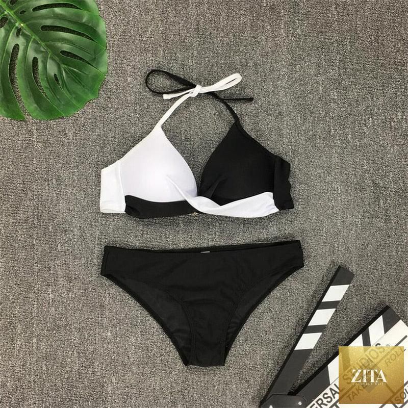 Stevvex two-piece women's bikini with push-up padding, halter bandage style, perfect for summer beachwear and swimming.
